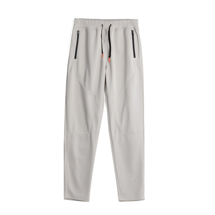 Men's sporty jogging pants with an innovative breathable structure and practical zippered pockets Lune London