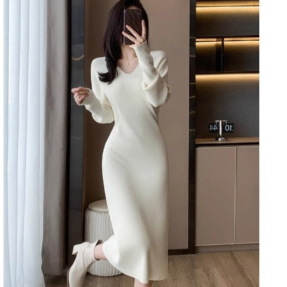 Knit dress for women with deep V-neck and specially designed structure Lune London