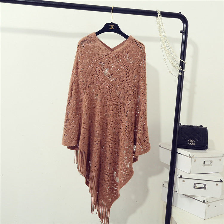 Knit poncho for women with an eye-catching crochet pattern and fashionable fringes Lune London