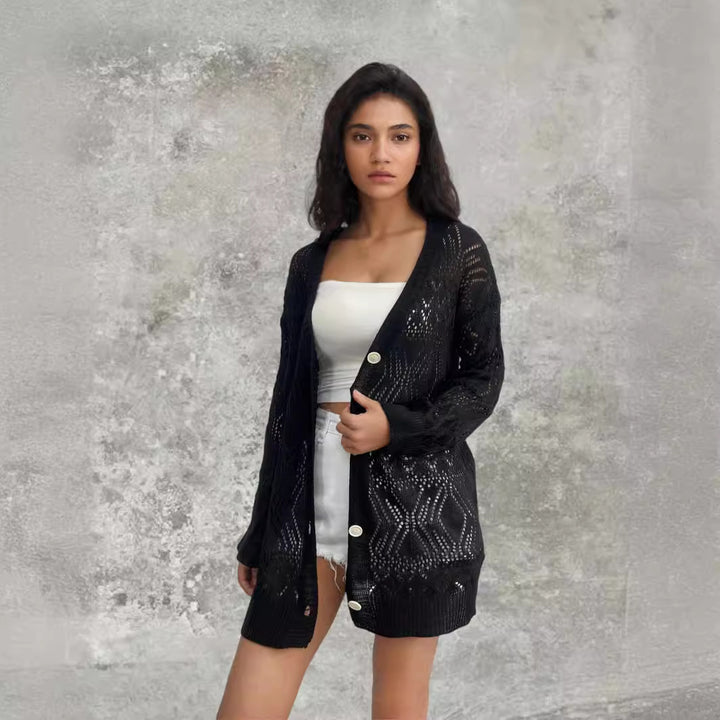 Knitted jacket for women with an artistic hole pattern and practical button details Lune London