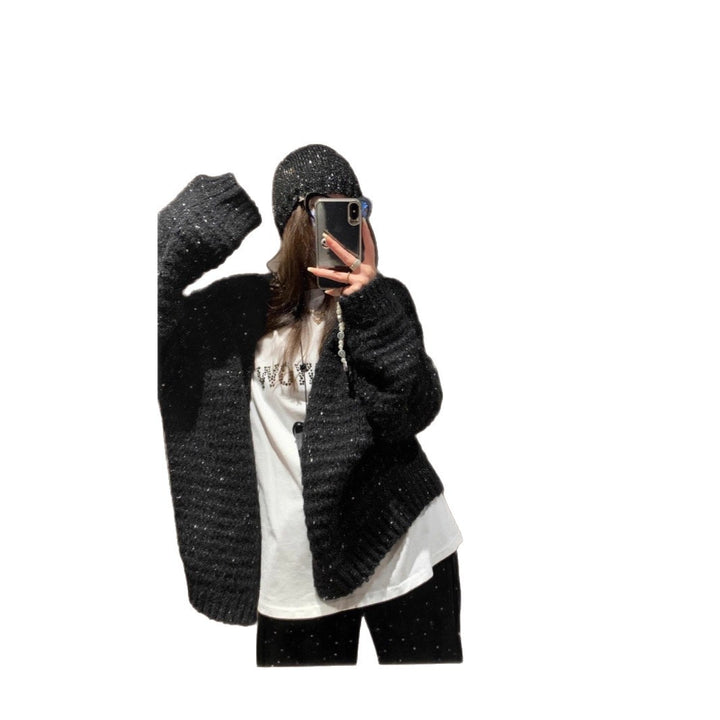 Knitted jacket for women with voluminous sleeves and a unique mesh structure Lune London