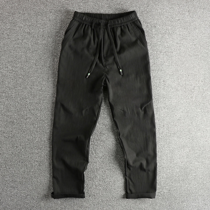 Men's athletic leisure pants with elastic waistband and practical drawstring Lune London