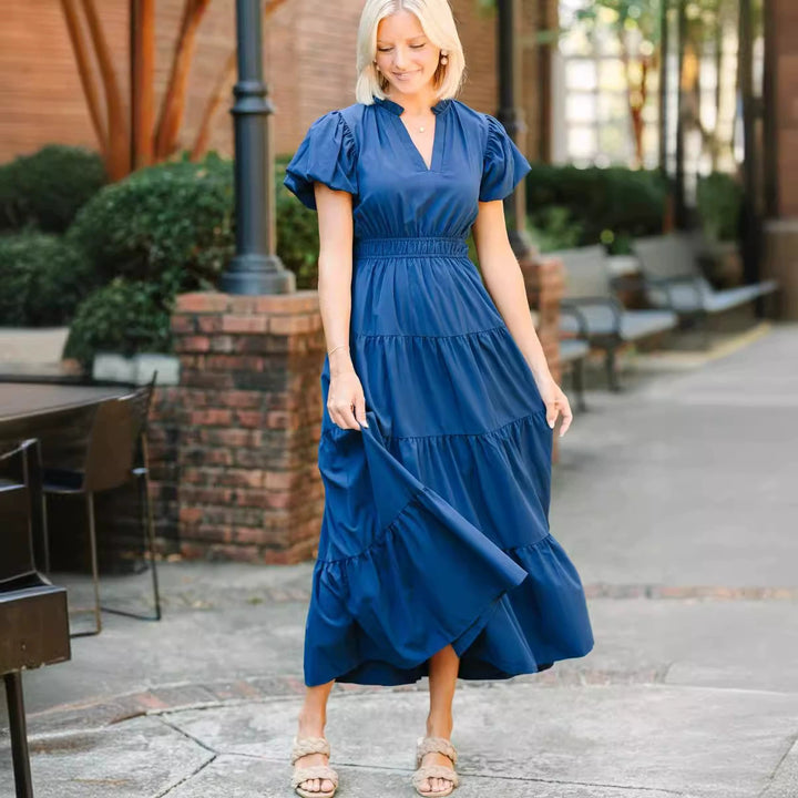 Women's midi dress with voluminous ruffles and flattering cut Lune London