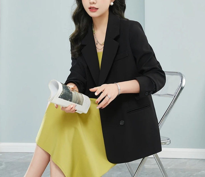 Blazer oversized élégant pour femmes avec patte de boutonnage double et détails élégants Chic & Stil