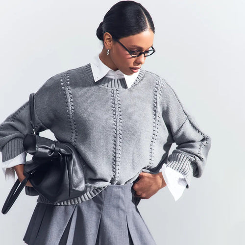 Casual knitted sweater for women with airy design elements and drop shoulders Lune London