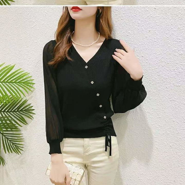 Elegant knitted sweater for women with button details and transparent sleeves Lune London