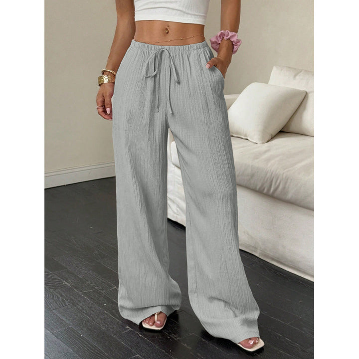 Casual and wide trousers for women with elastic waist and tie belt Lune London