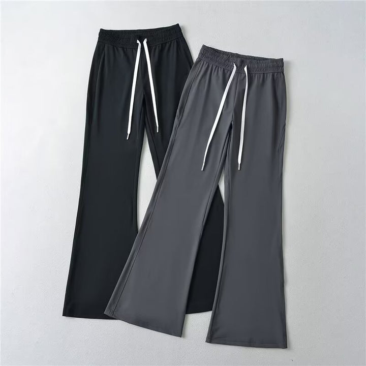 Pantalons évasés sportifs pour femmes avec taille élastique et poches pratiques Chic & Stil