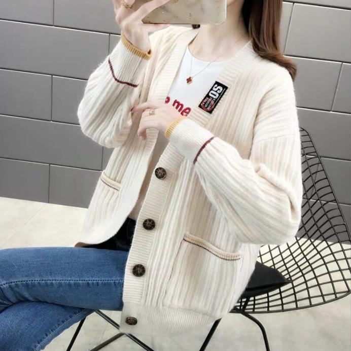 Cardigan for women with textured ribbed pattern and practical pockets Lune London