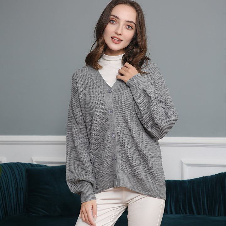 Women's knitted jacket with structured pattern and practical button details Lune London