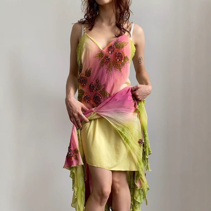 Asymmetrical summer dress for women with a floral design and delicate spaghetti straps Lune London