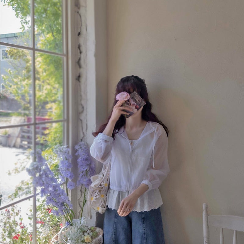 Blouse aérienne pour femmes avec col à fermeture éclair Chic & Stil