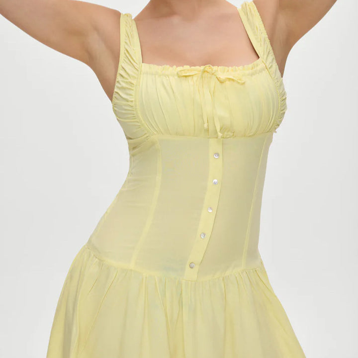 Lune London Mini dress for women with ruffle details and decorative bow