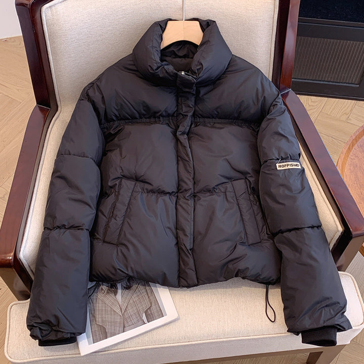 Short Puffer jacket for women with high collar and practical pockets Lune London