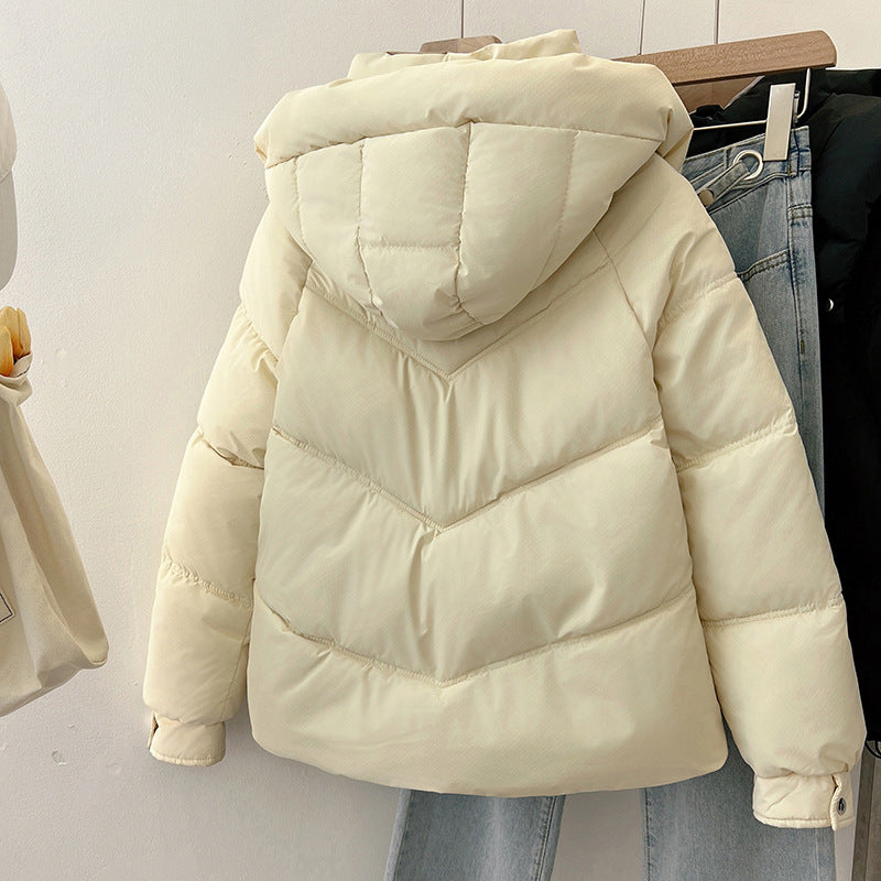 Quilted jacket with stand-up collar for women with practical pockets Lune London