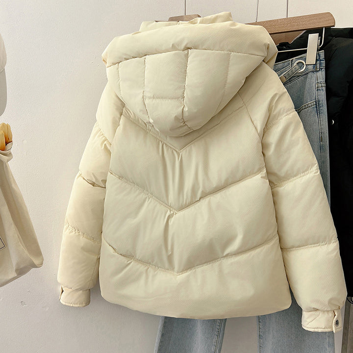 Quilted jacket with stand-up collar for women with practical pockets Lune London