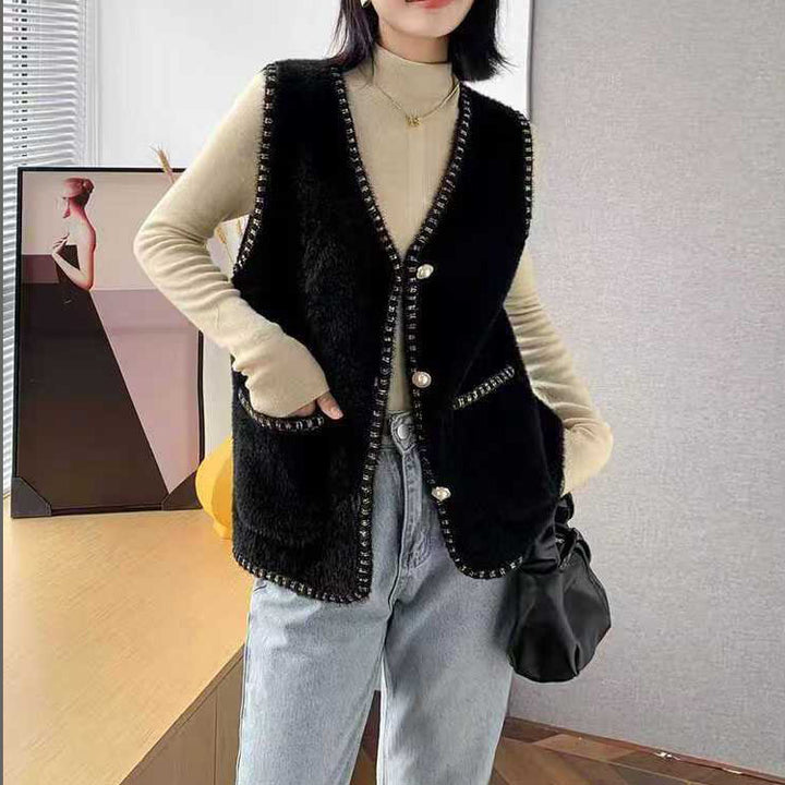Ladies knitted vest with decorative button details Lune London