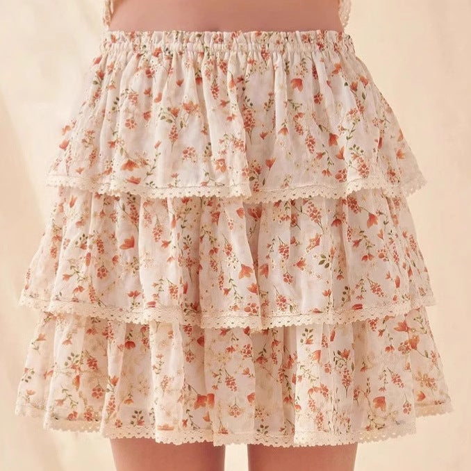 Flared mini skirt for women with floral ruffle details Lune London