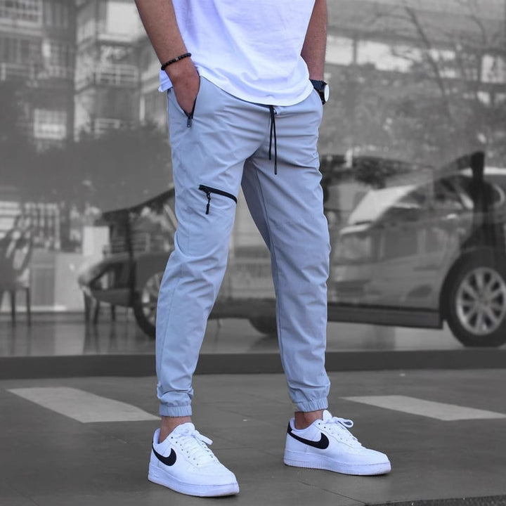 Men's sporty leisure pants with elastic waistband and practical zip pockets Lune London