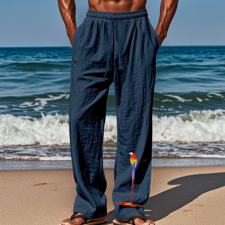 Casual beach pants for men with elastic waistband and colorful bird pattern Lune London