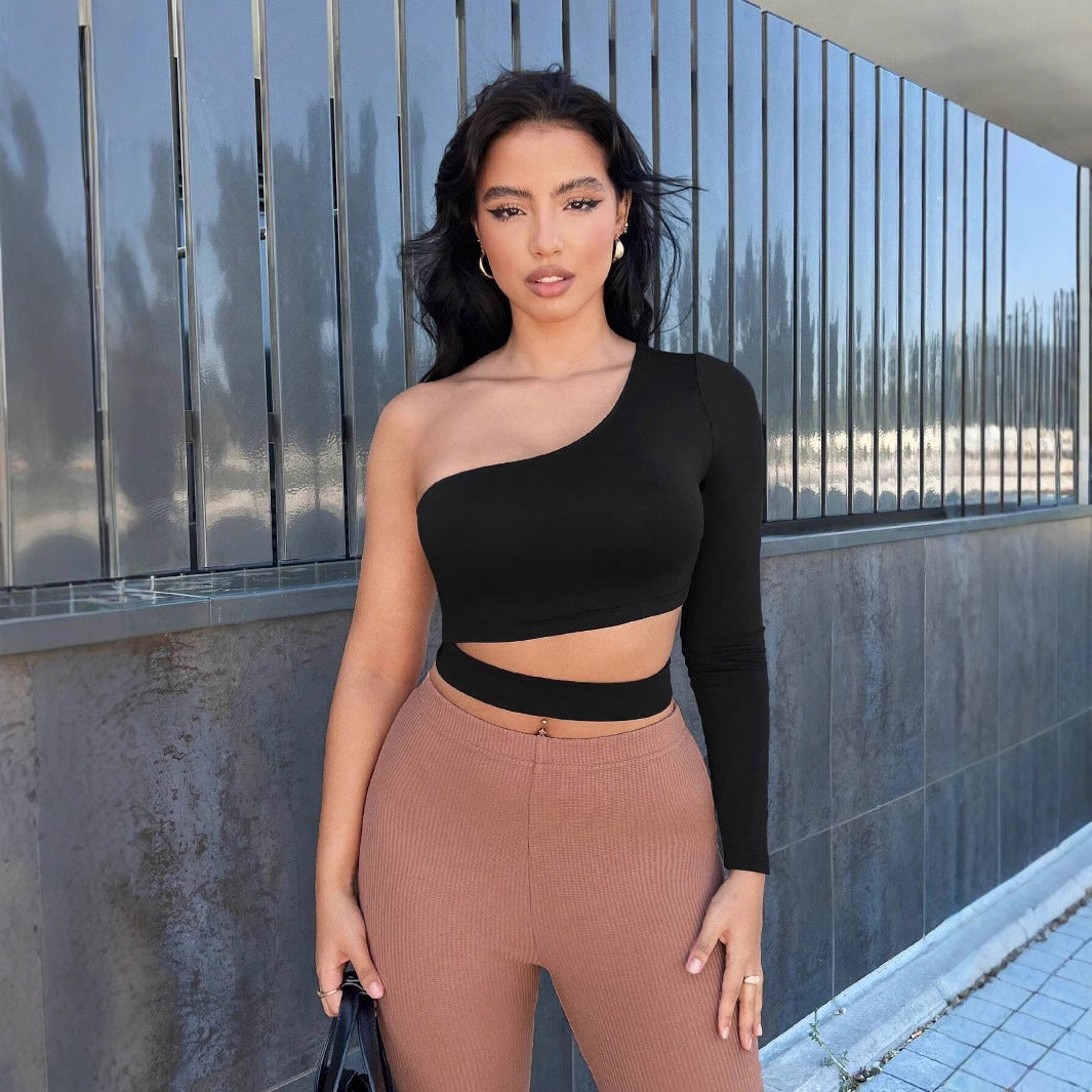 Asymmetrical cropped women's top with one long sleeve Chic & Stil