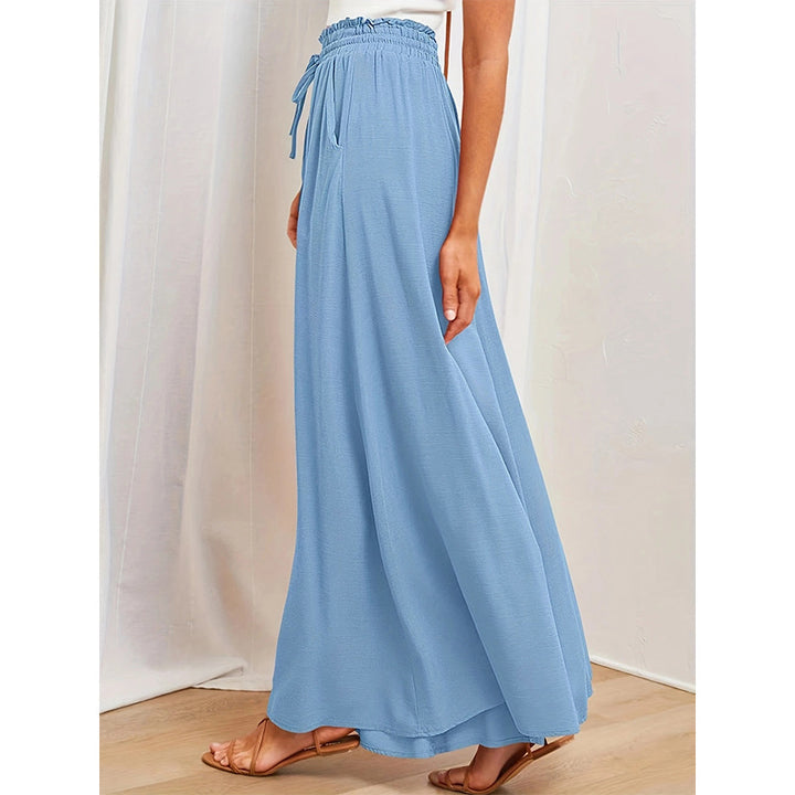 Loose summer pants for women with elastic waistband and practical pockets Lune London