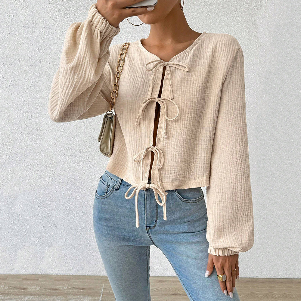 Short blouse top for women with sophisticated lace-up details Chic & Stil