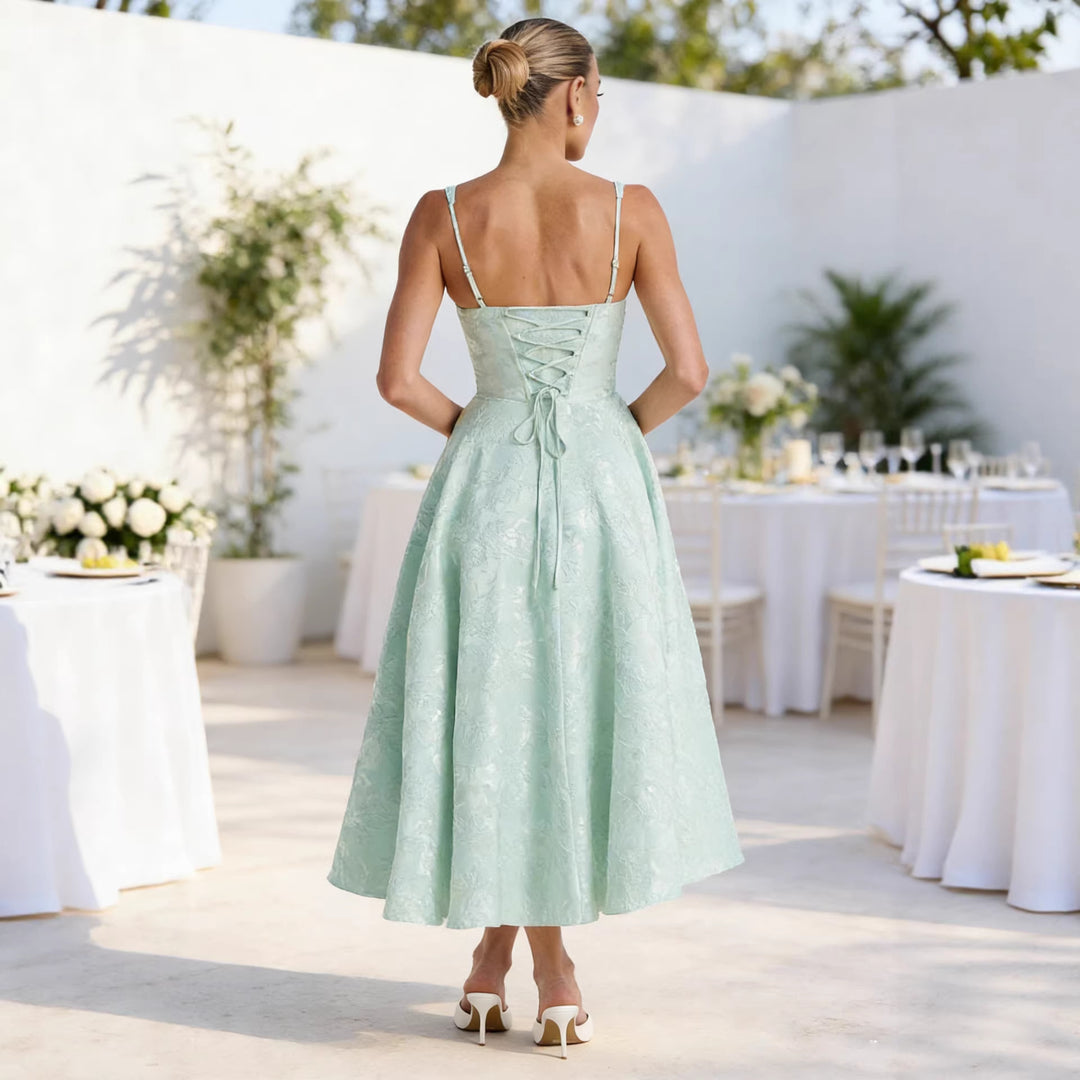 Glamorous cocktail dress for women with ruffled top and voluminous skirt Chic & Stil