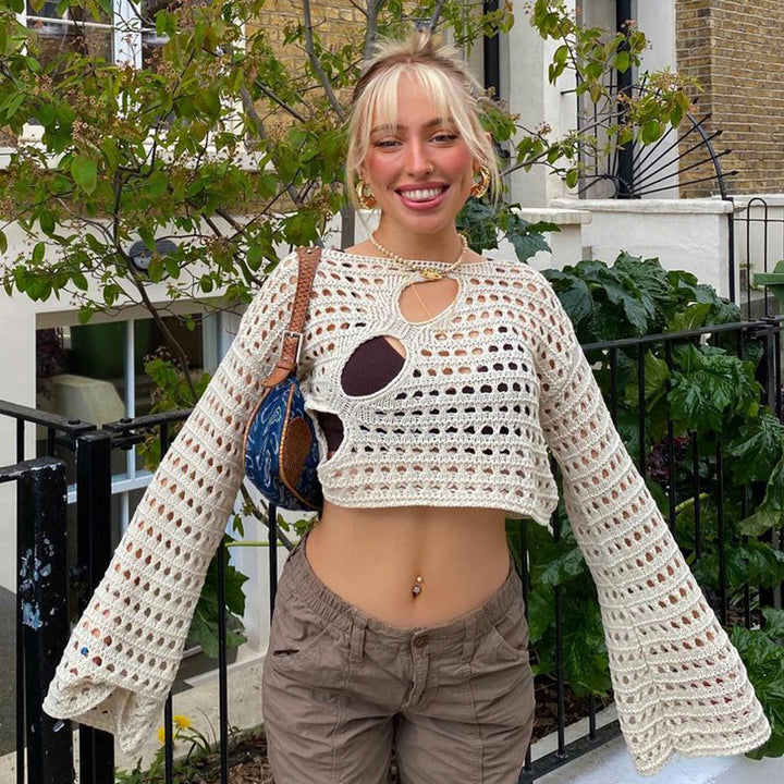 Ladies casual cropped knit sweater with a unique hole pattern Lune London