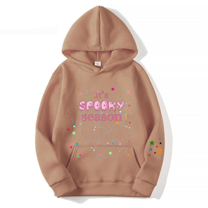 Women cozy hoodie with graphic Halloween design Chic & Stil