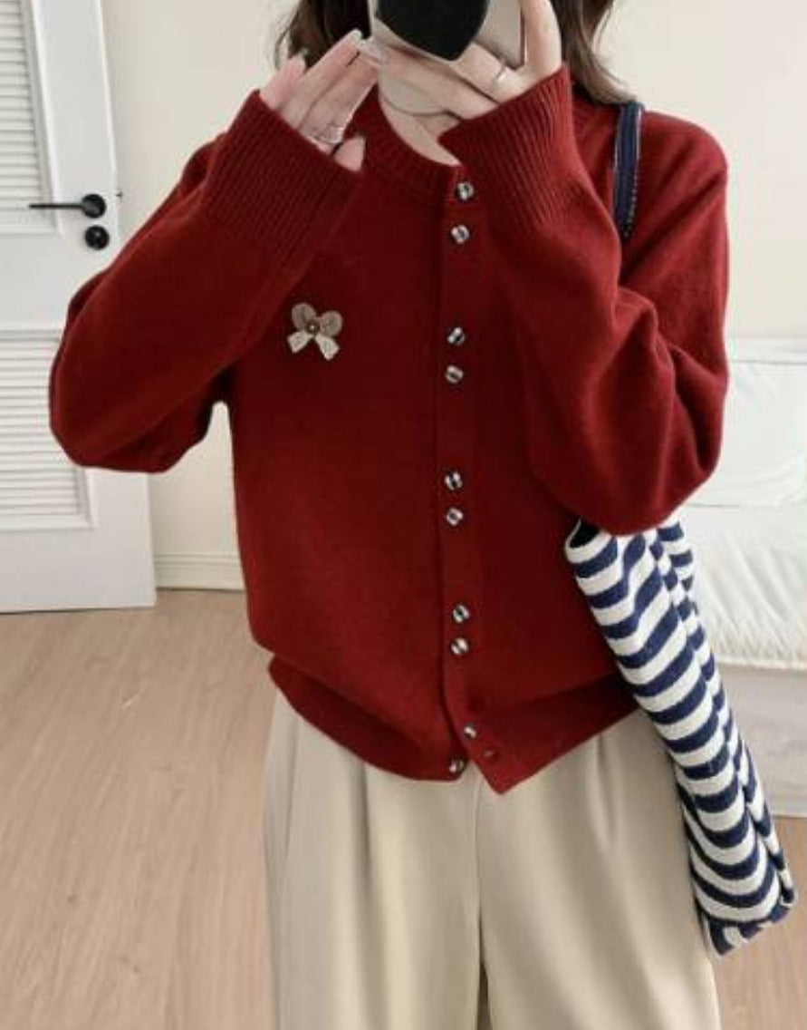 Ladies comfortable knitted cardigan with shiny buttons and decorative application Lune London