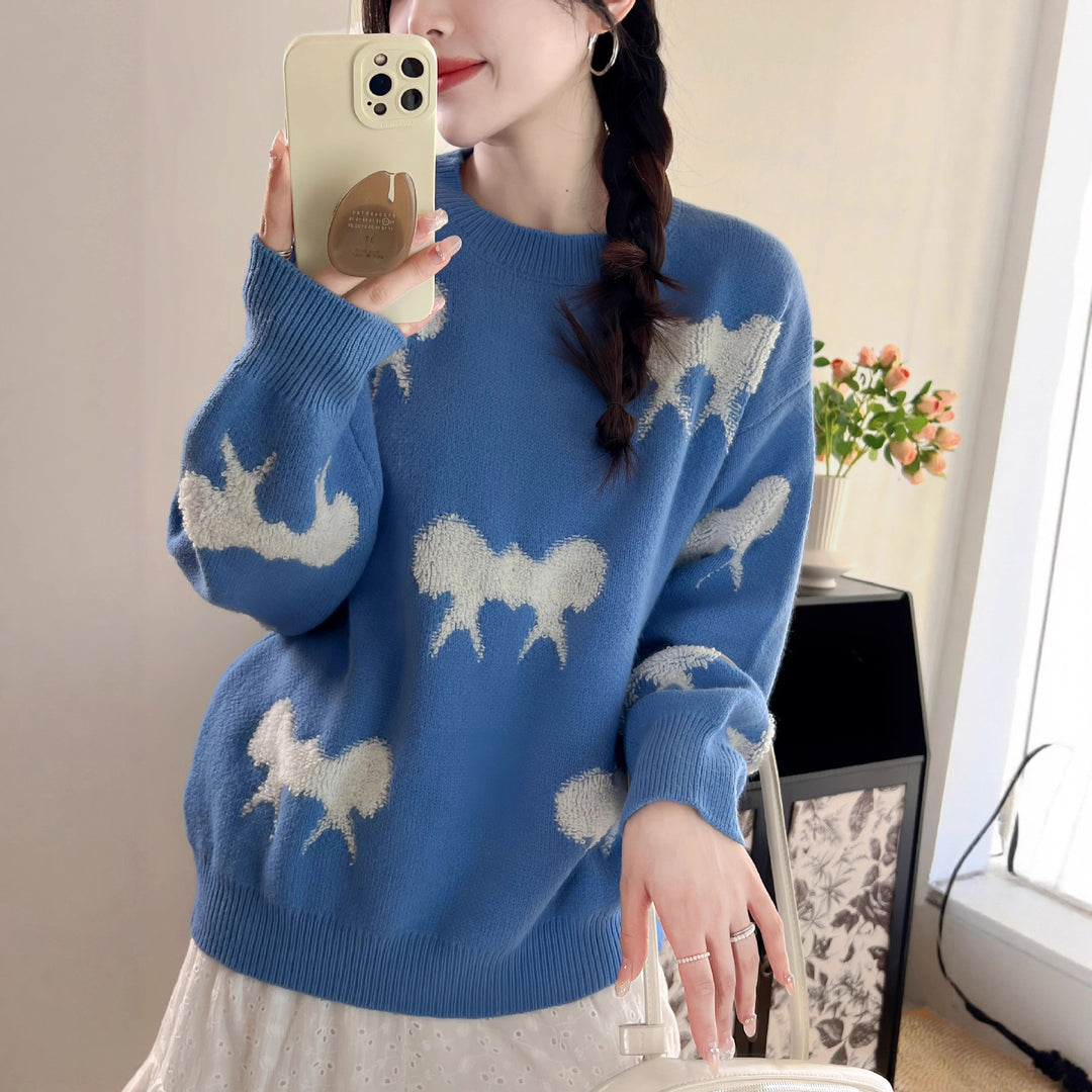 Cozy knitted sweater for women with playful bow pattern Lune London