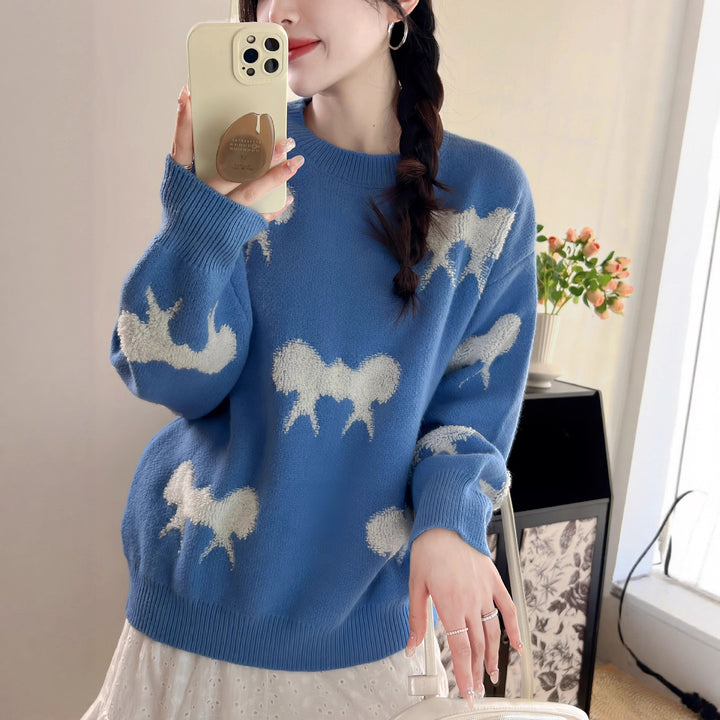 Cozy knitted sweater for women with playful bow pattern Lune London
