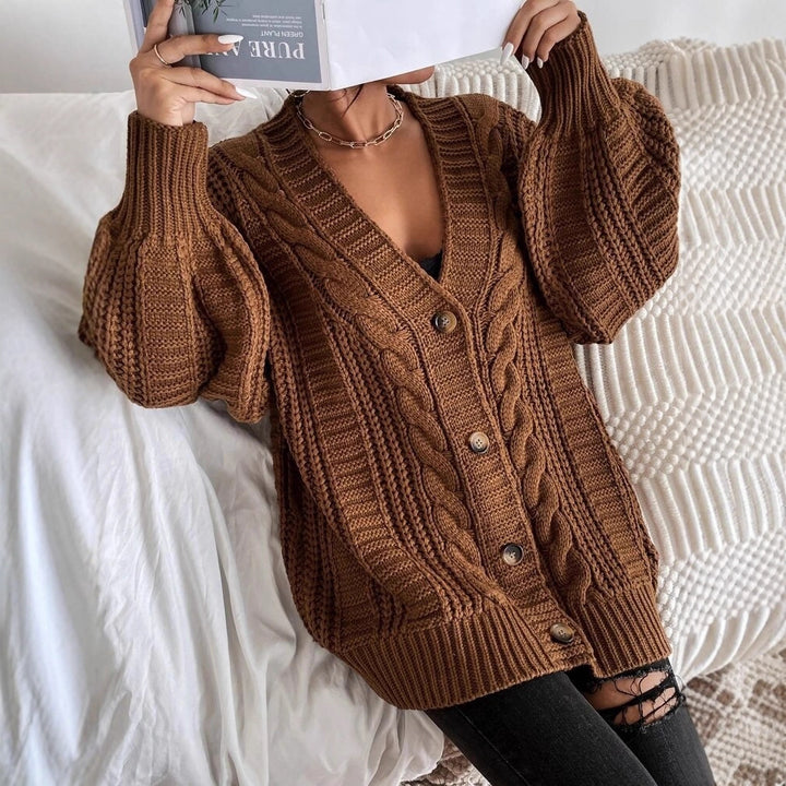 Thick knitted jacket for women with characteristic twisted design Lune London