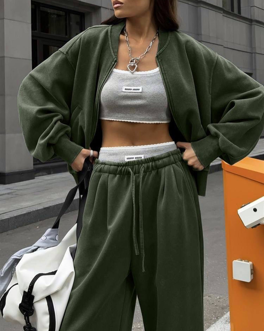 Casual outfit for women with wide pants and sporty jacket Lune London