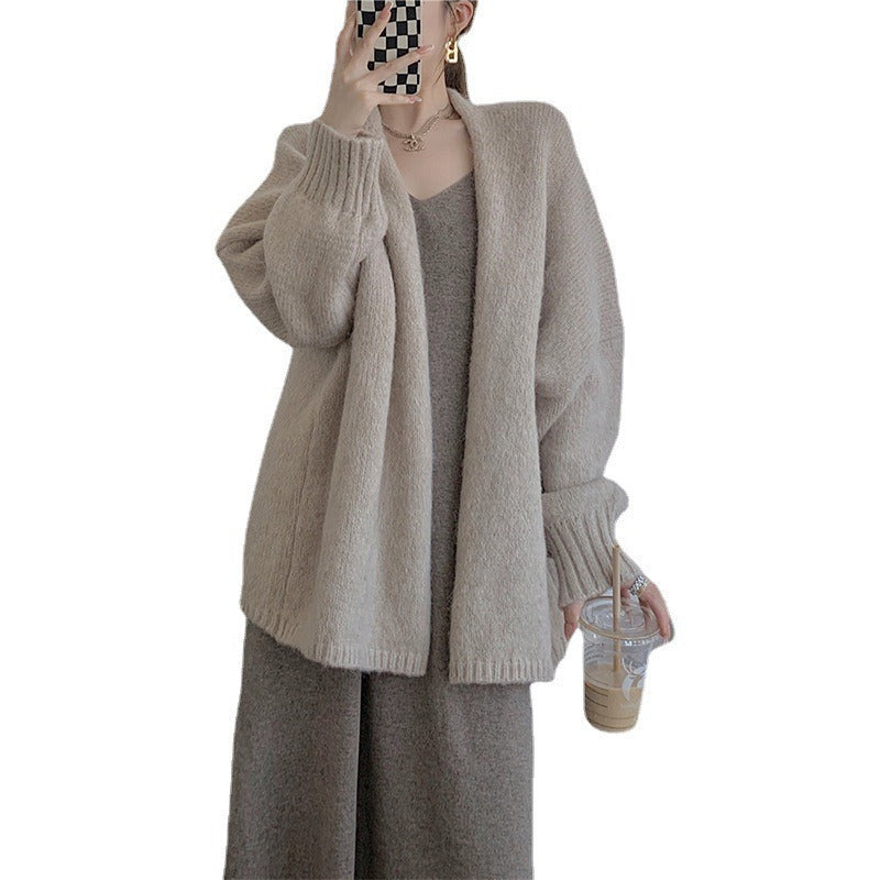 Pull surdimensionné et confortable pour femme avec décolleté en V profond et manches longues Chic & Stil