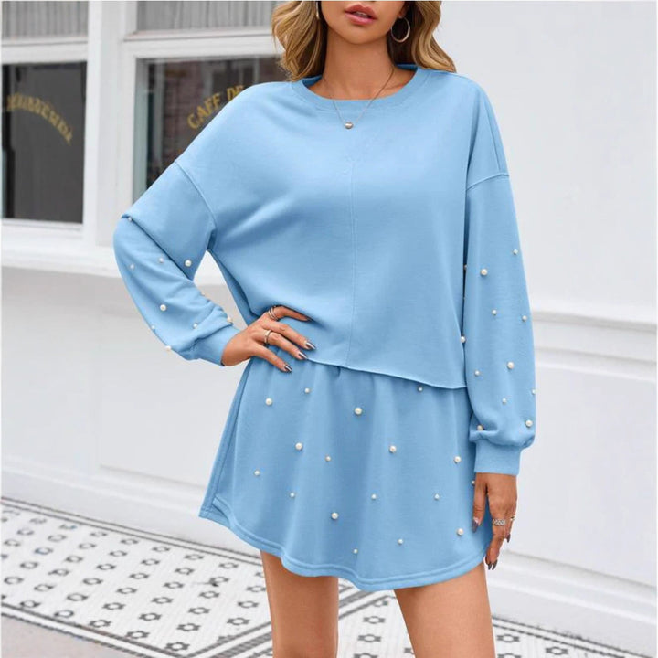 Robe sweat-shirt pour femmes avec des creux et des applications de perles Chic & Stil