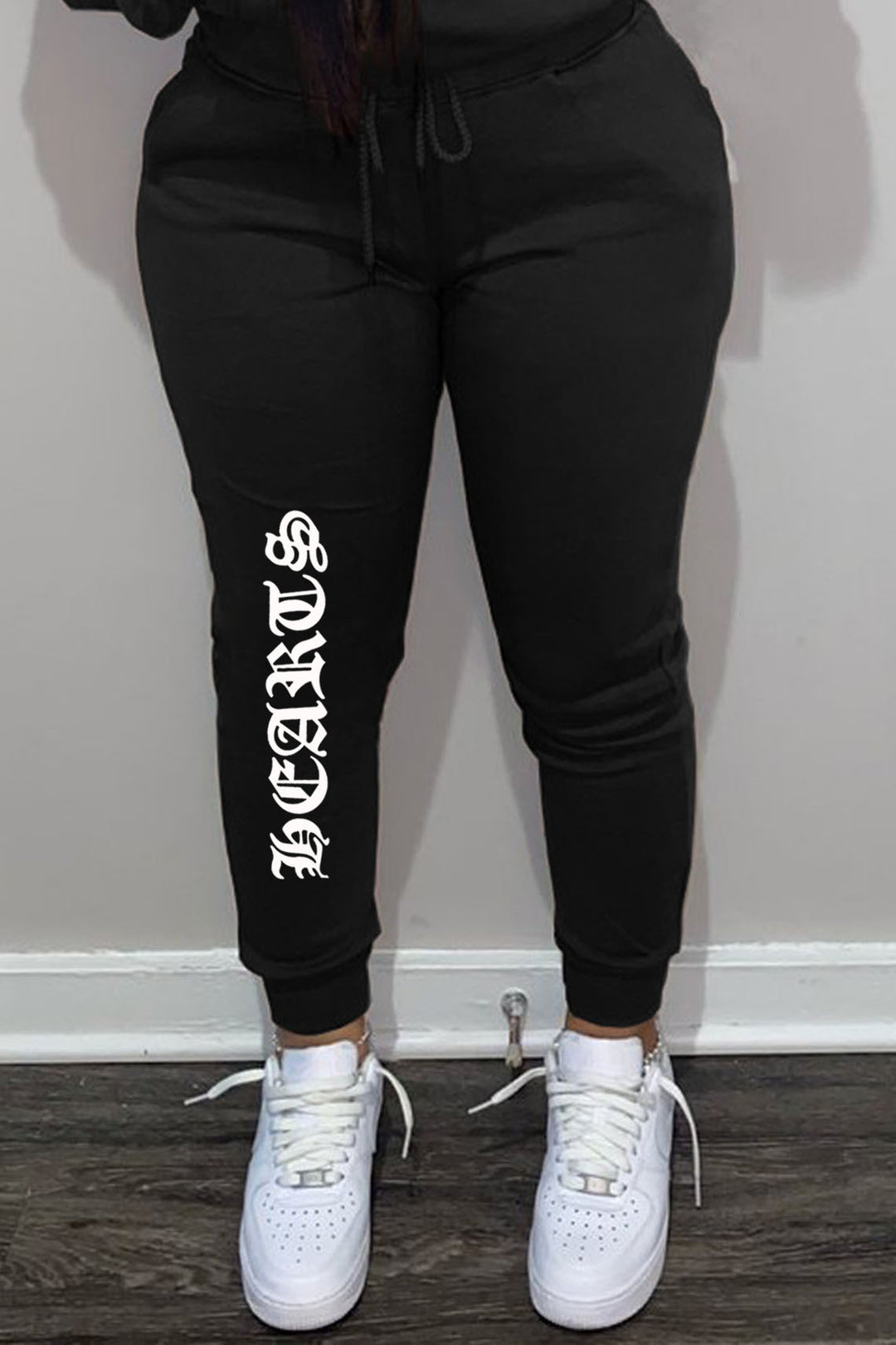 Comfortable women's joggers with side inscription Lune London