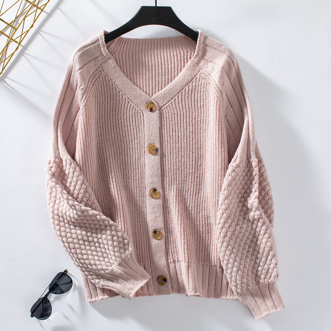 Women knitted cardigan with structured sleeves and wood details Lune London