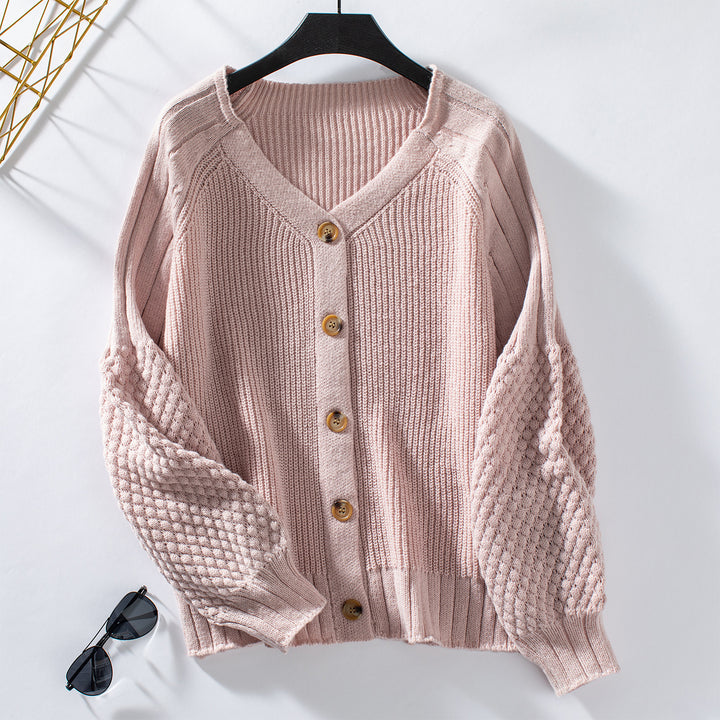 Women knitted cardigan with structured sleeves and wood details Lune London