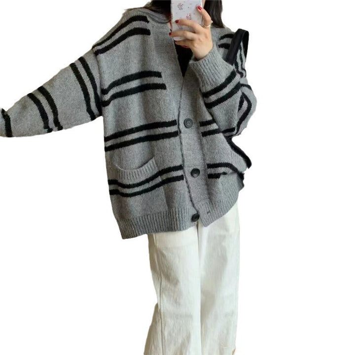 Chunky knit cardigan for women with wide lapels and decorative button details Lune London