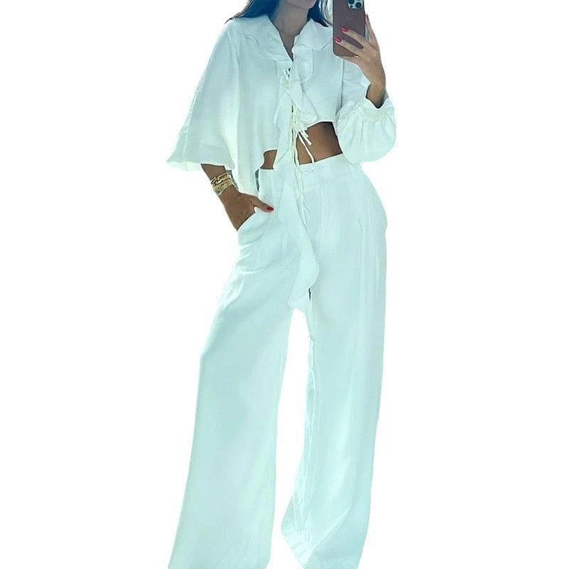 Ladies two-piece set with asymmetric cropped top and wide pants