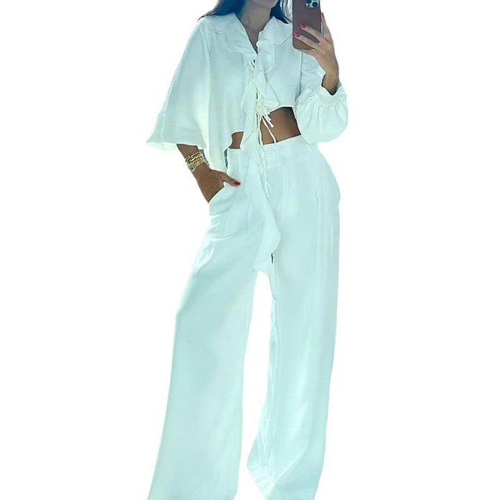 Ladies two-piece set with asymmetric cropped top and wide pants