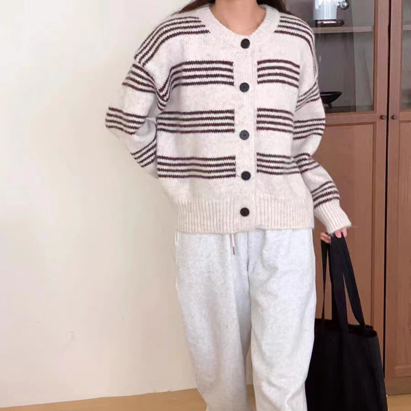 Fashionable knit jacket for women with a fine striped texture and decorative buttons Lune London