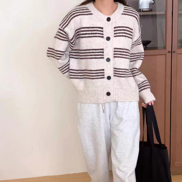 Fashionable knit jacket for women with a fine striped texture and decorative buttons Lune London