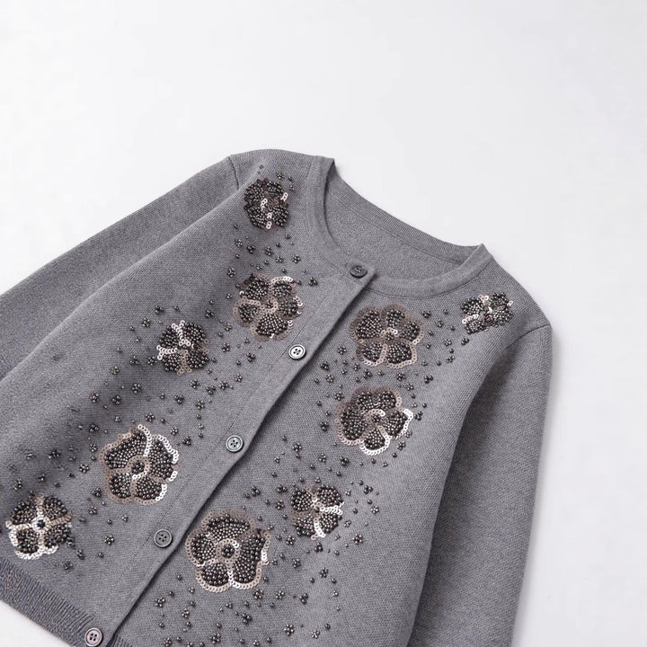Cardigan pour femmes avec des détails floraux scintillants Chic & Stil