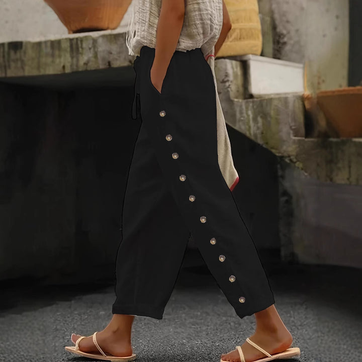 Wide trousers for women with button details on the sides and elastic waist Lune London