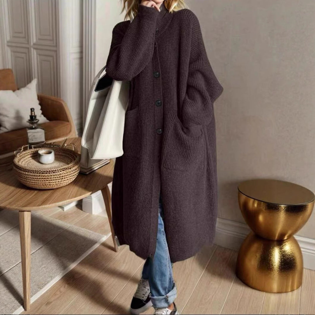 Trendy knitted jacket for women with generous pockets and chic button detail