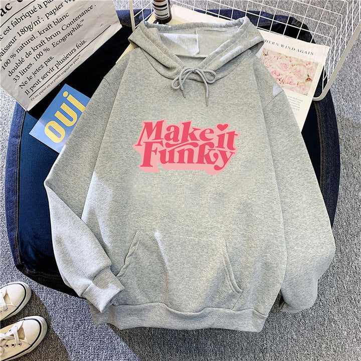 Women's hoodie with striking lettering Chic & Stil