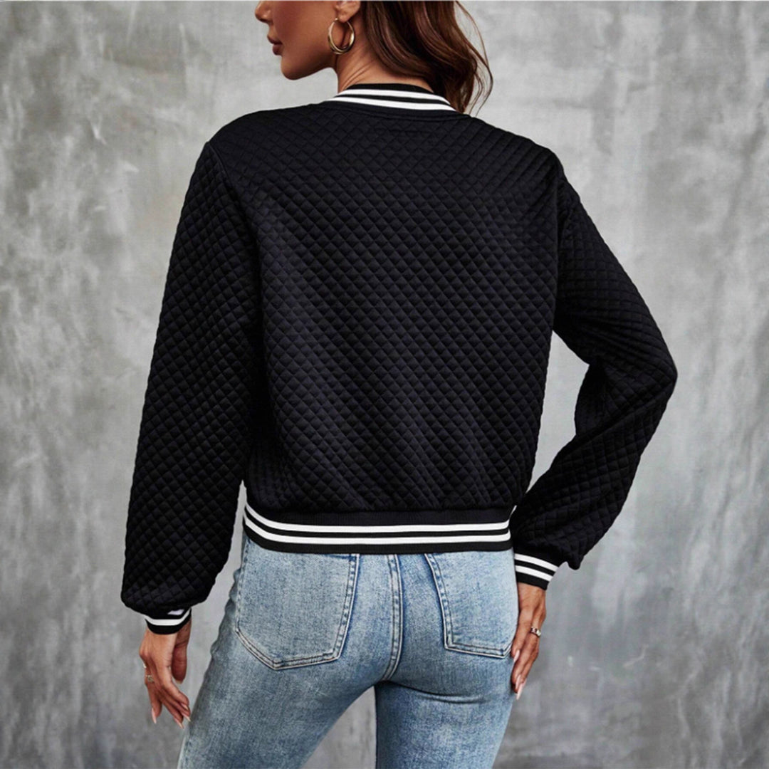 Veste matelassée femme au design sportif avec des manches contrastées Chic & Stil